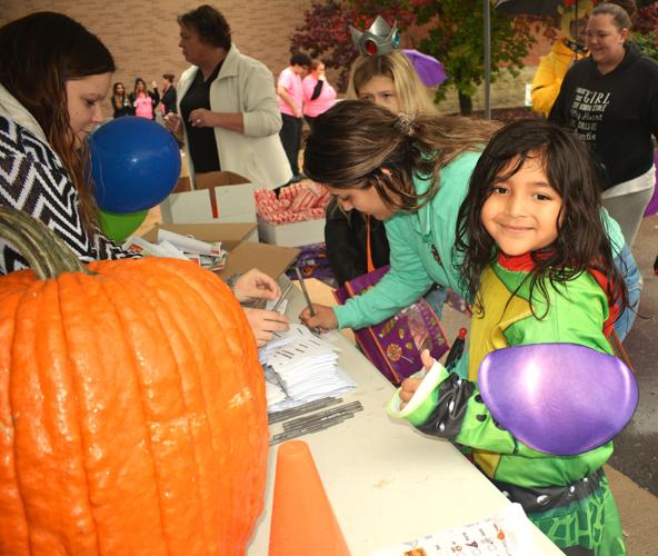 Beloit Trunk or Treat goes on in spite of sprinkles Local News