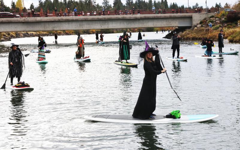 Witches take over Deschutes River for Halloween paddle Local&State