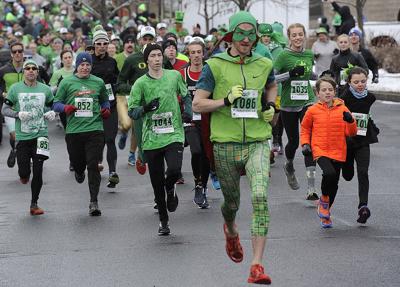 Runners brave snowfall at St. Patrick’s Day Dash