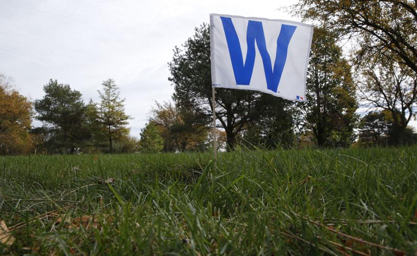 A baseball sits on the grave stone of famed Chicago Cubs