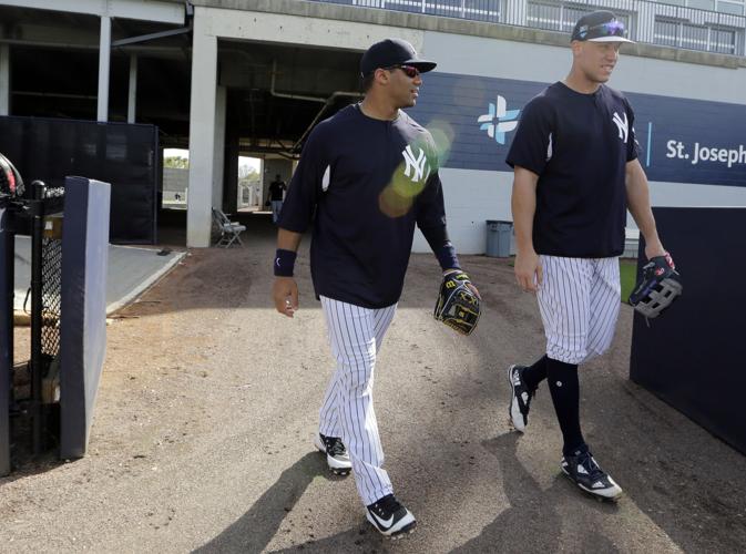 Pinstripe passer: Russell Wilson works out with Yankees