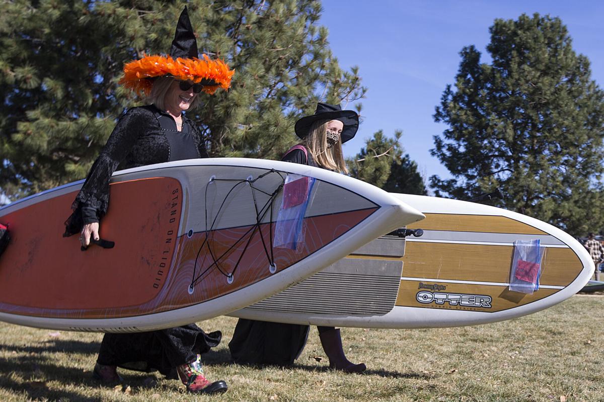 Witches take over Deschutes River during Halloween paddle Local&State