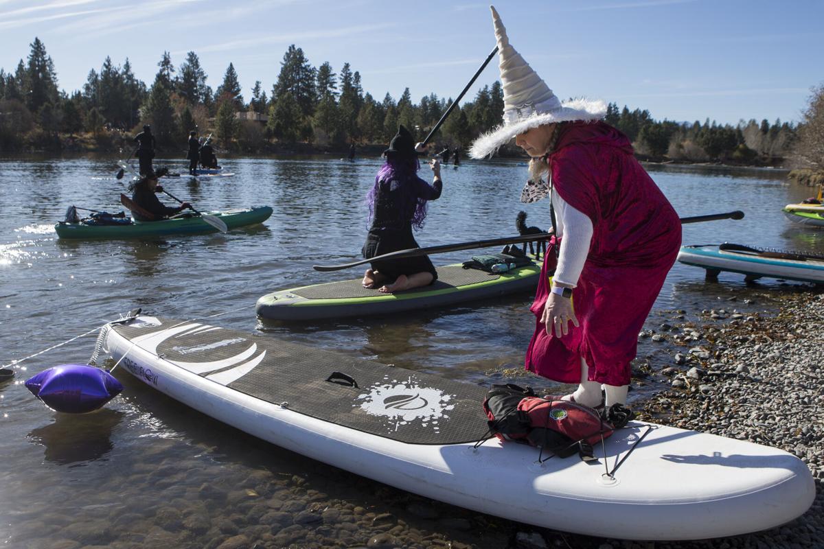 Witches take over Deschutes River during Halloween paddle Local&State