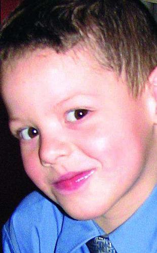 Stepfather charged as dead boy remembered