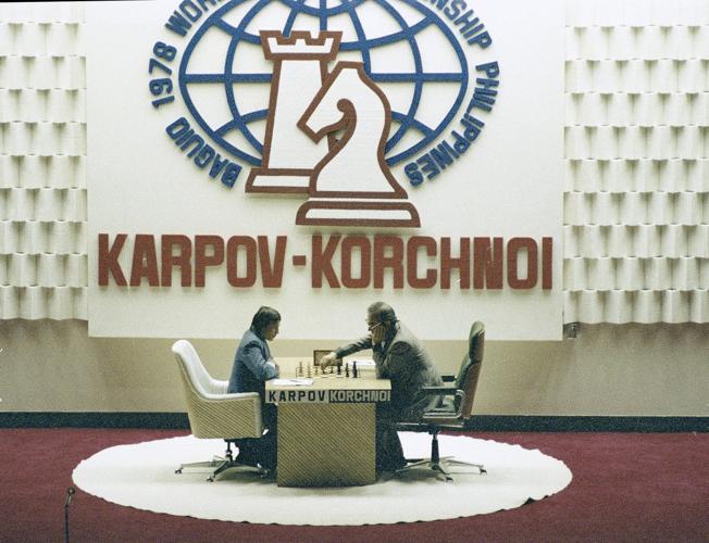 A judge checks player's chairs in the Karpov v Kasparov world