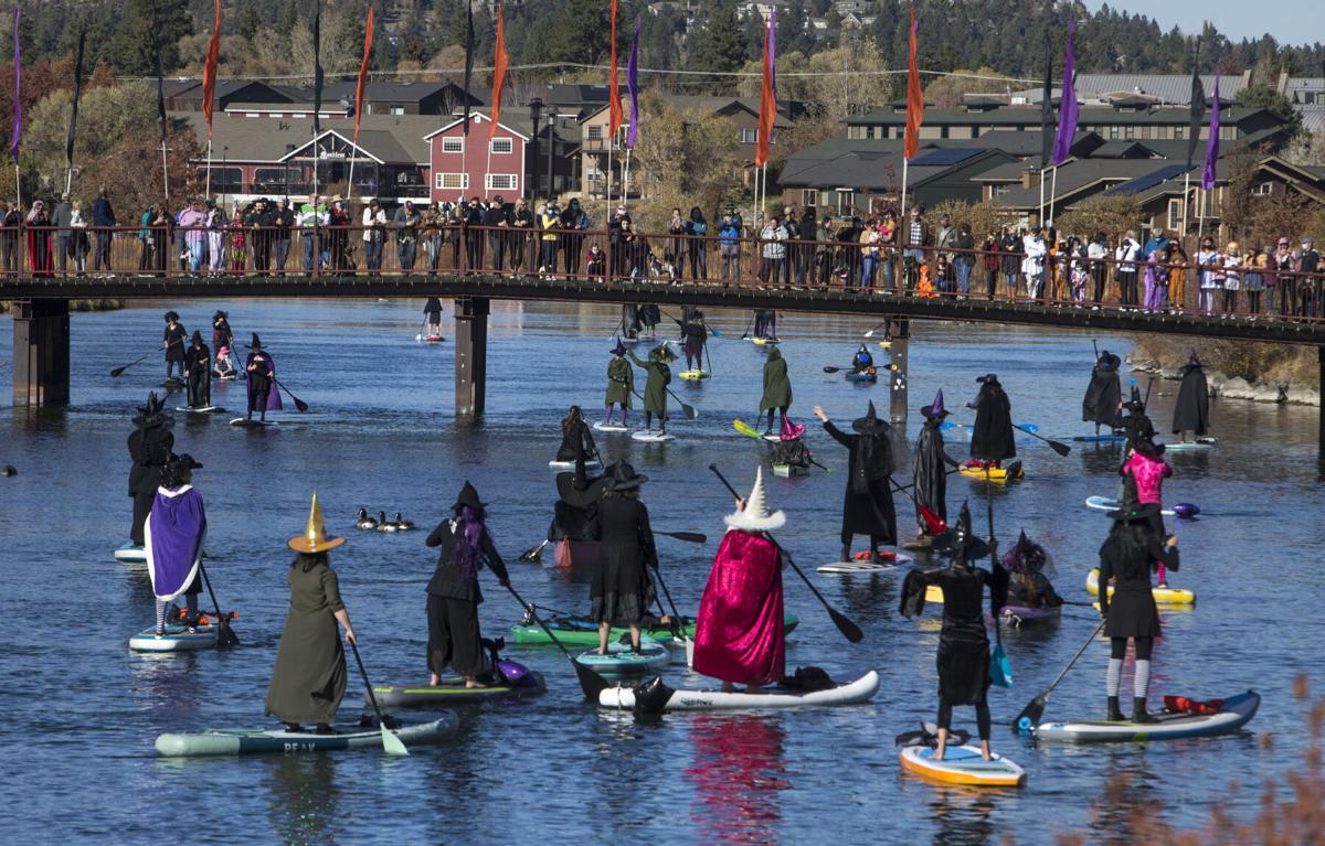 Witches take over Deschutes River during Halloween paddle Local&State