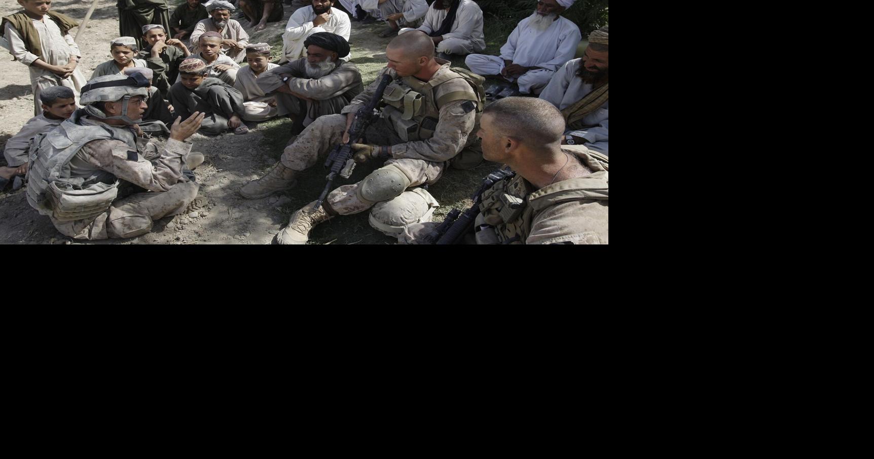 First evacuation flight brings 221 Afghans, many kids, to US