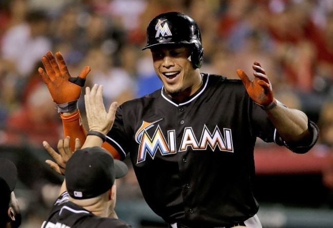 It's official: NL MVP Giancarlo Stanton now slugging for the Yankees
