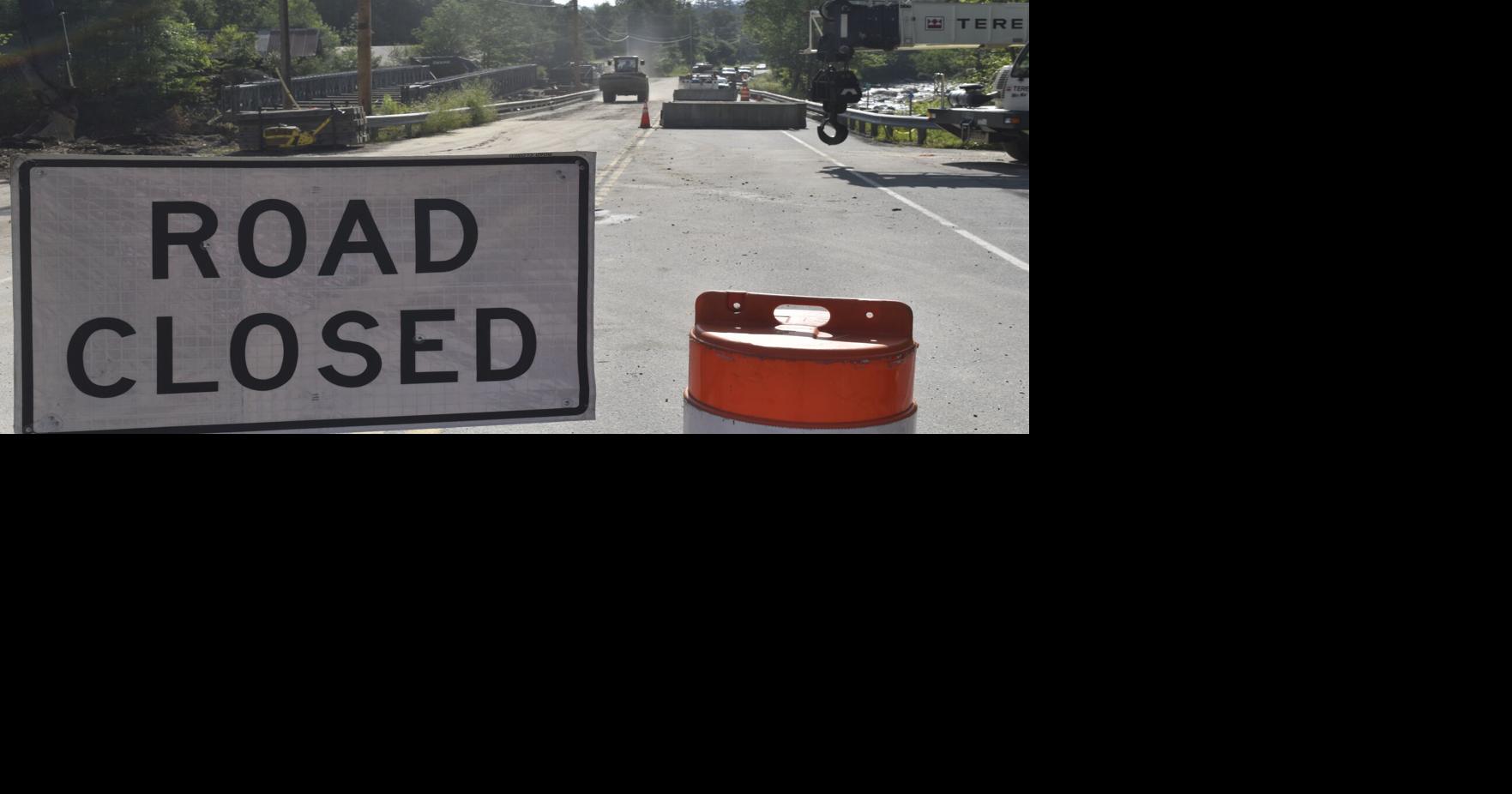 Temporary bridge being built over Winhall River while Route 30 remains