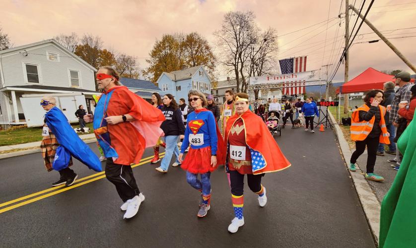 Superheroes take to the streets to benefit local Teens 4 Change | Local ...