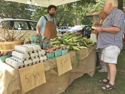 Arlington farmers market restarts July 10