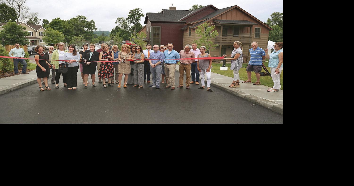 Monument View Apartments complete, community celebrates at ribbon