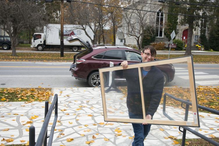 Warm hearts, warm homes Window Dressers volunteers build inserts to