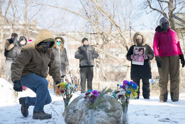 _On Saturday, January 15, family, friends and community members gather near the stone where Emily Hamann was fatally attacked in downtown Bennington along the Walloomsac Pathway, marking the 1 Year Anniversary of .jpg