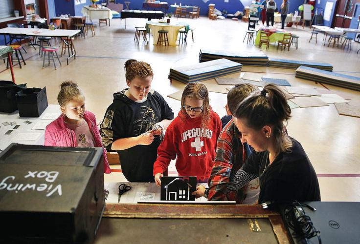 School gym becomes pop-up science museum