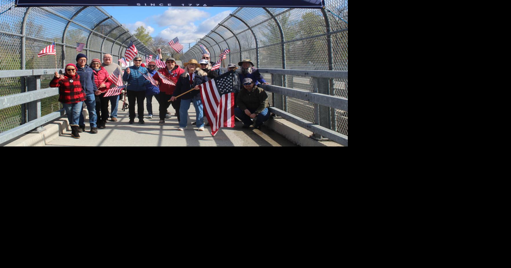 Activists hold May Day protest on overpass