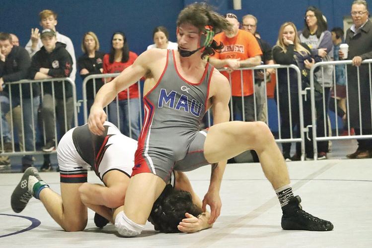 Regional champion: Wilkins takes 195-pound crown for second time