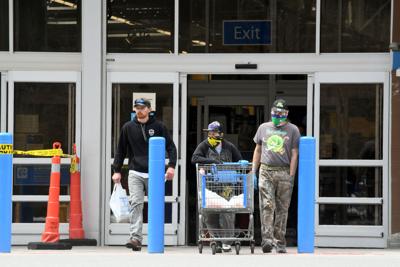 Masked men leave Walmart pushing cart