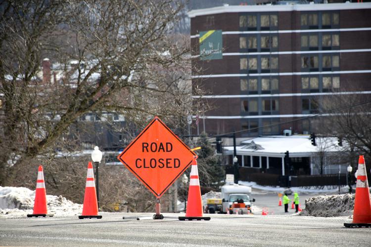A road closed sign on West Main Street
