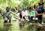 Pownal students release classroom-grown trout