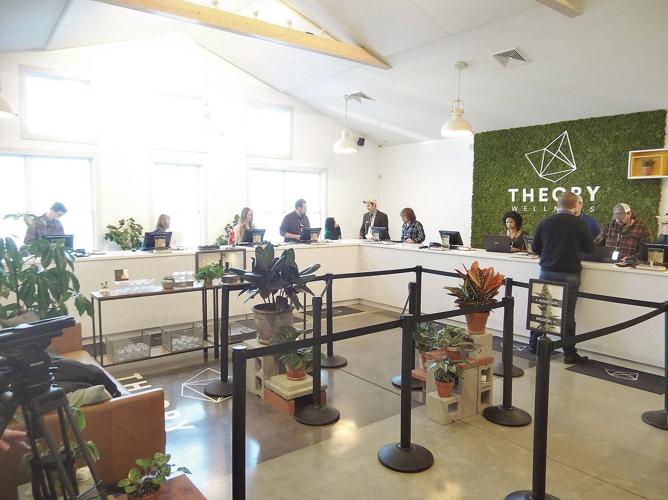 Customers swarm Theory Wellness for county's first legal marijuana sales