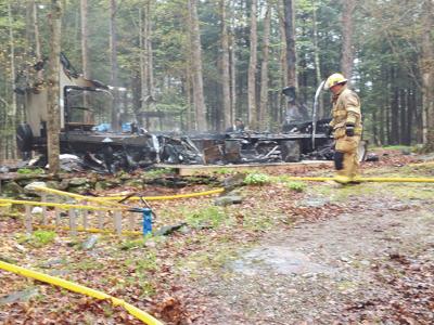 Fire destroys camper, no injuries