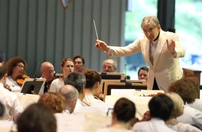 Man conducts orchestra