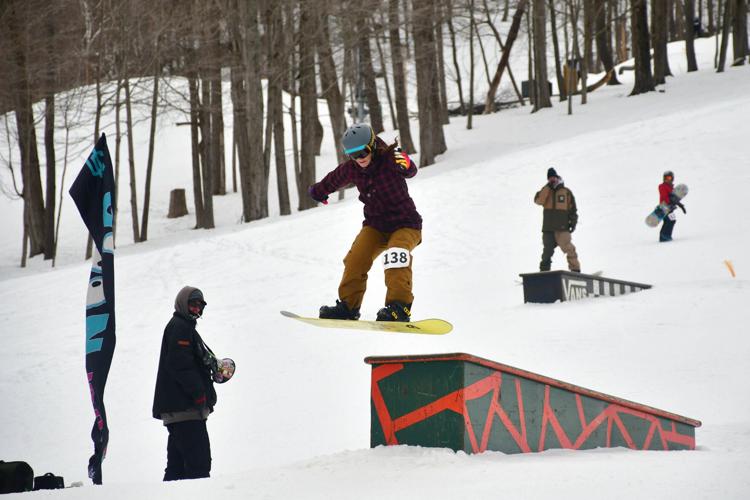 Snowboarders compete