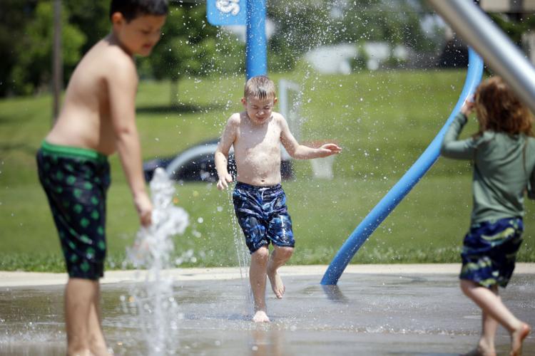 Photos Beating the heat at the Clapp Park splash pad Multimedia