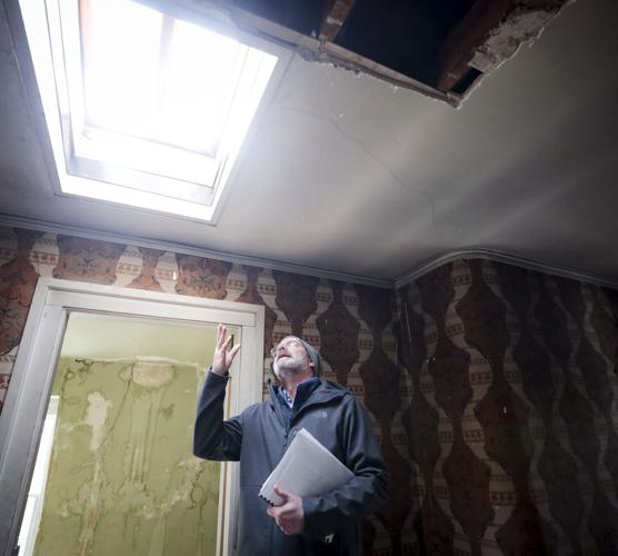 jim mcgrath pointing up at skylight