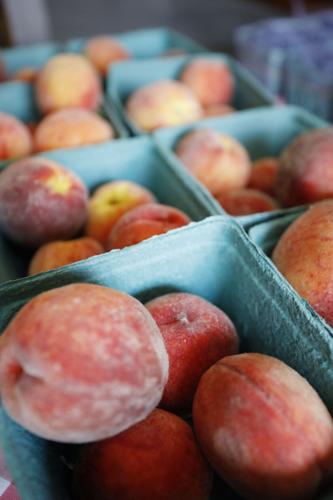 peaches in cardboard containers
