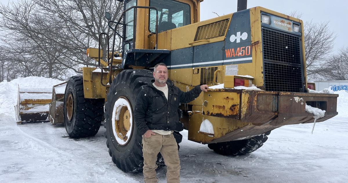 At Berkshire Crossing, snow piles rise as plow drivers work through the night