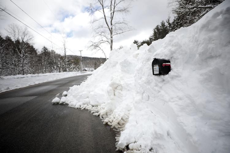 mailbox completely covered in snow