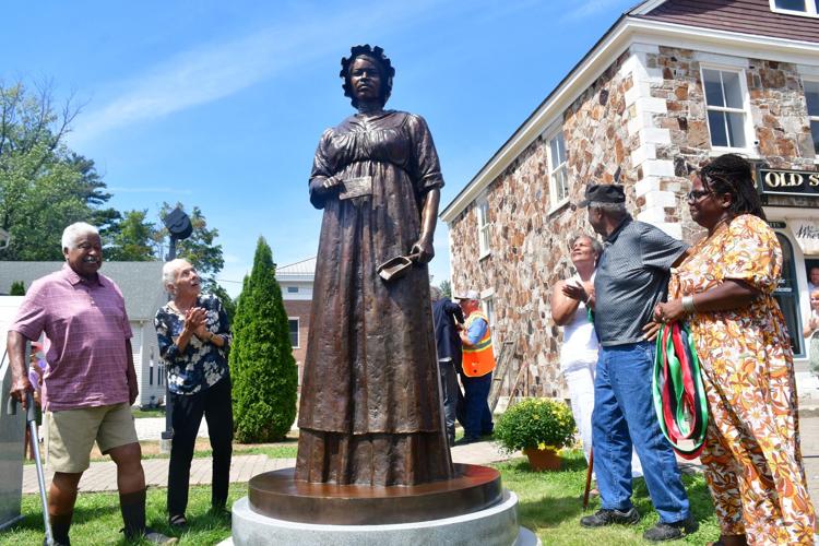 People look at the statue