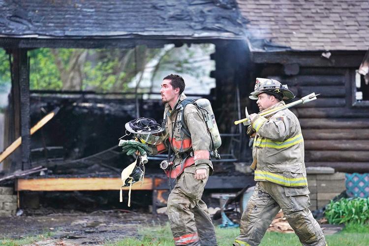 2 displaced after fire guts Lee cabin