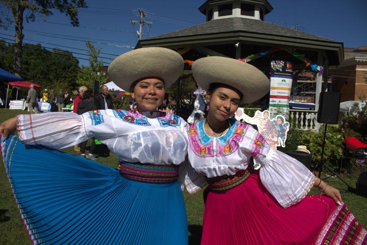 two girls wearing traditional Ecuadorian dress