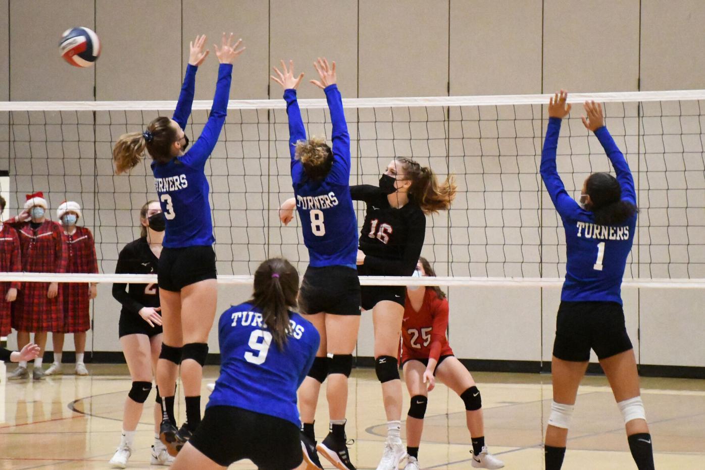 Savage spikes the ball