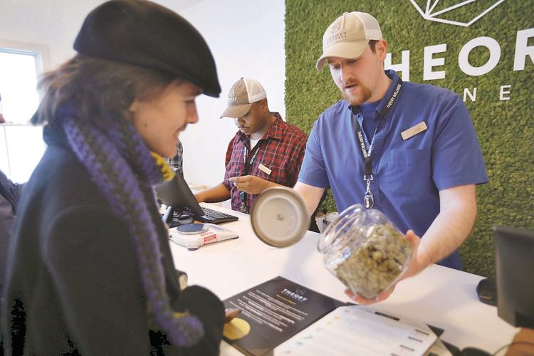 Customers swarm Theory Wellness for county's first legal marijuana sales