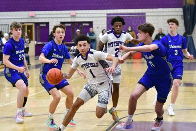 Boys play basketball