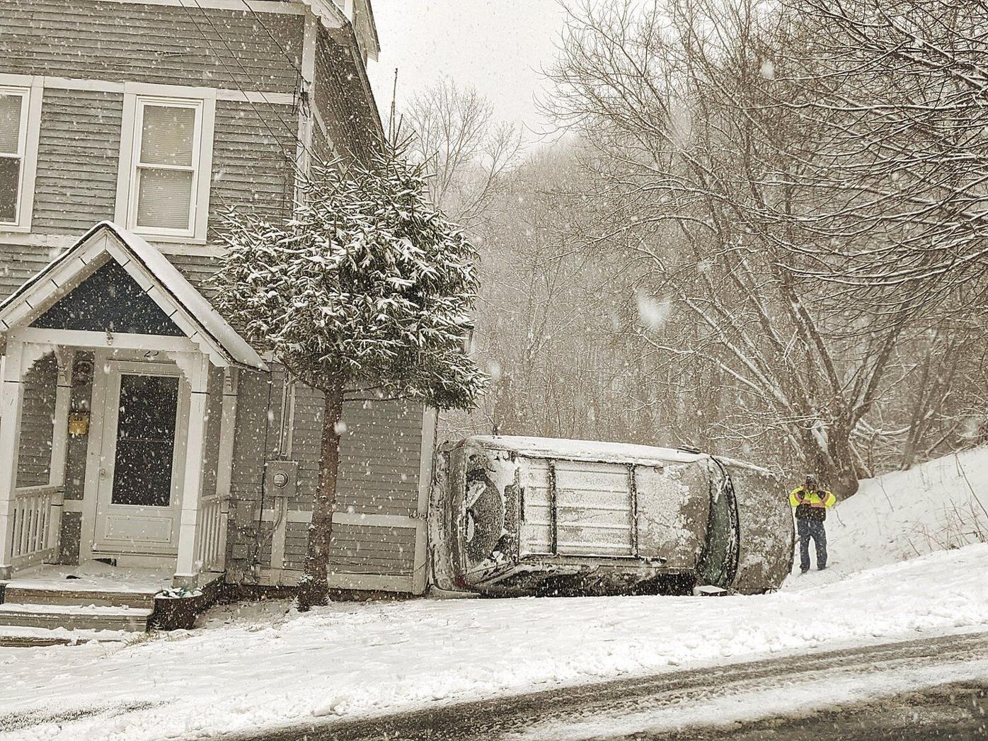 Man walks away from North Adams accident after SUV flips on slick road