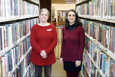 Christine Warner and Samara Klein in library
