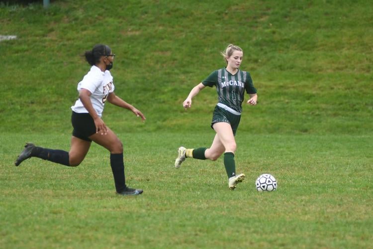 Izzy LaCasse carries the ball down the field