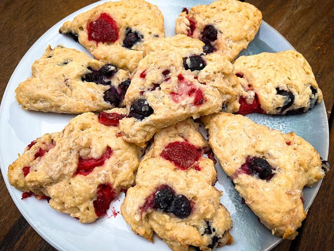 Strawberry and blueberry scones on a plate