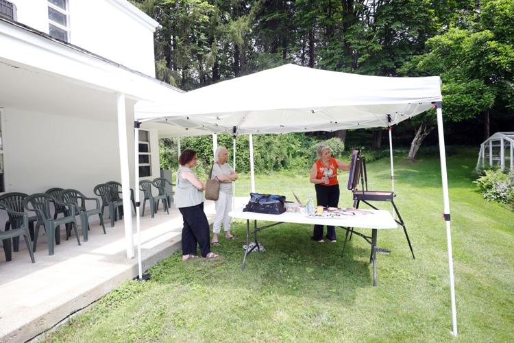 Diane Firtell talking to visitors