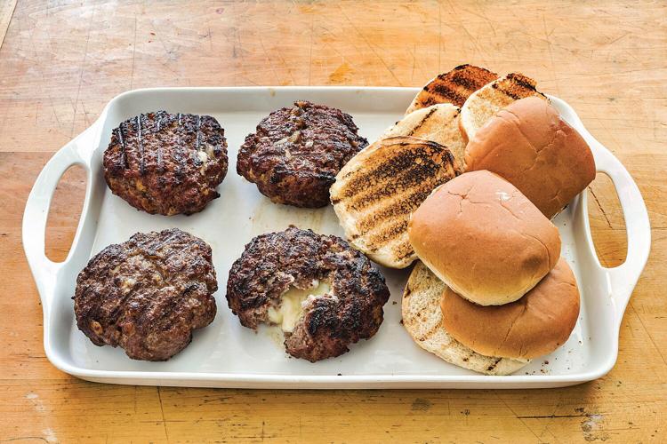 A moist beef burger stuffed with American cheese