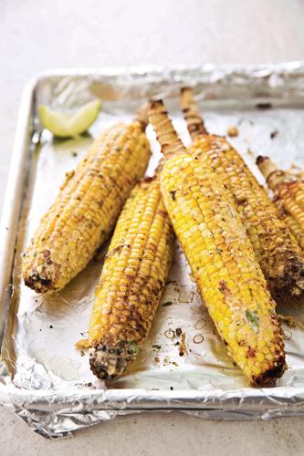 Messy, cheesy and utterly delicious grilled corn