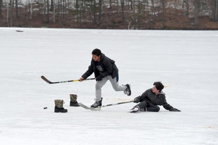 One on one hockey match at Windsor Lake Multimedia