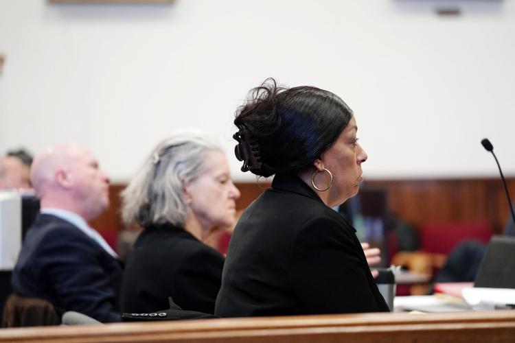A judge dismissed the murder charge against one of the defendants