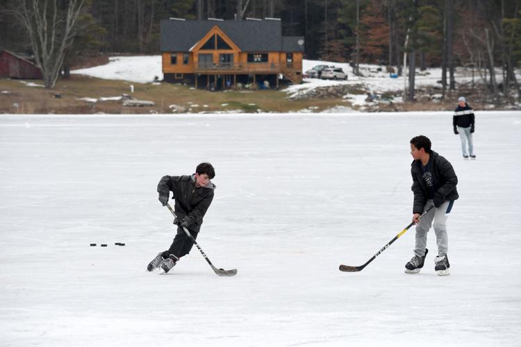 One on one hockey match at Windsor Lake Multimedia