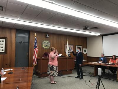 Joshua Vallieres is sworn in as city clerk